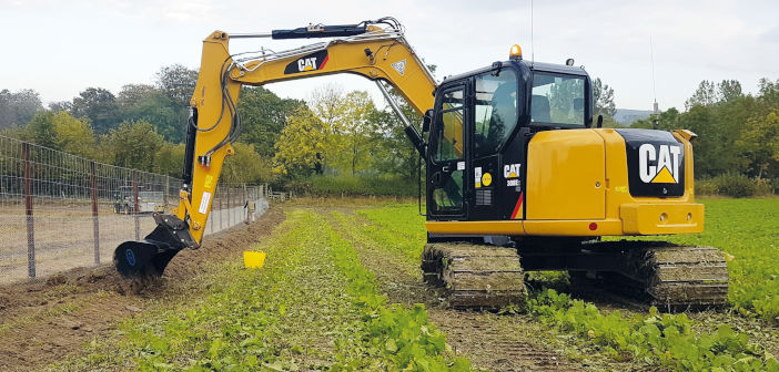 Working on the fringes cat_excavator_james_rose