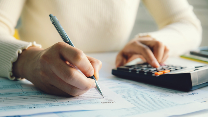 Making Tax Digital proposals to impact many farming businesses Closeup,Woman,Filling,Form,Of,Individual,Income,Tax,Return,