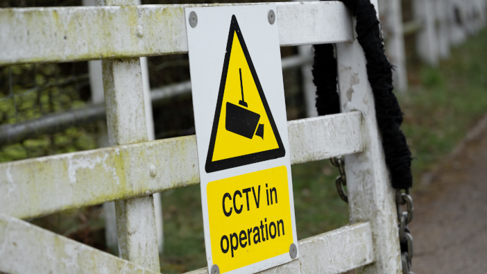 Generic,Cctv,Warning,Sign,Seen,Attached,To,A,Garden,Gate