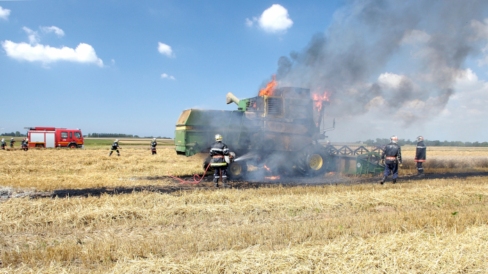 NFU Mutual calls for fire prevention action on farms Somme,,France,,August,2015.,Fire,Of,A,Combine,Harvester,During