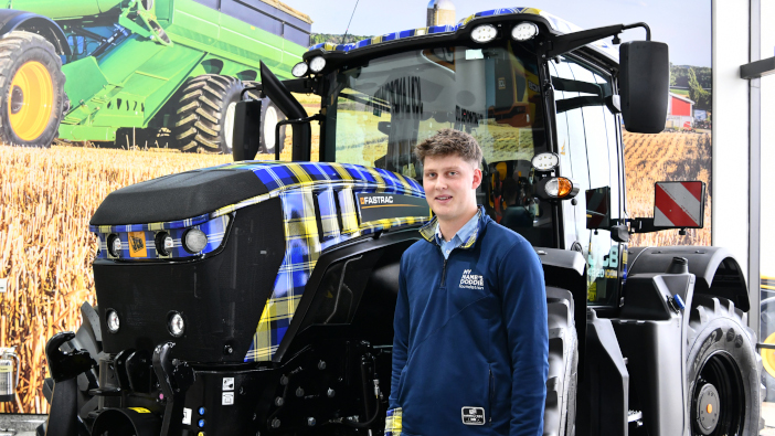 JCB unveils tartan tractor to honour rugby legend