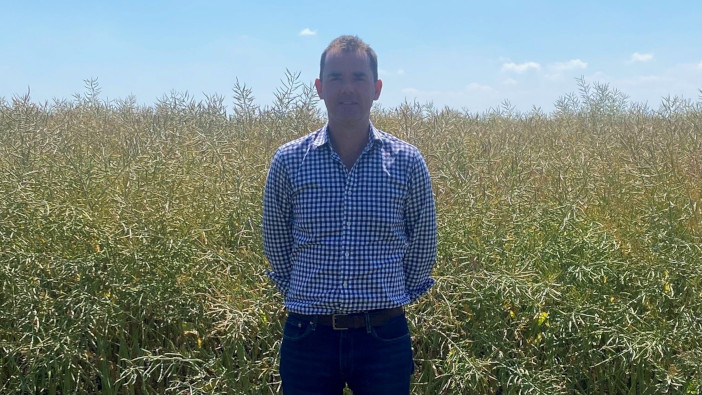 Cambridgeshire farmer on the hunt for the next Campus Jimmy Dunlop in front of a crop of Pinnacle
