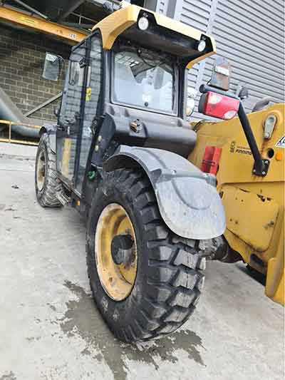 Ascenso tractor with tyre in foreground