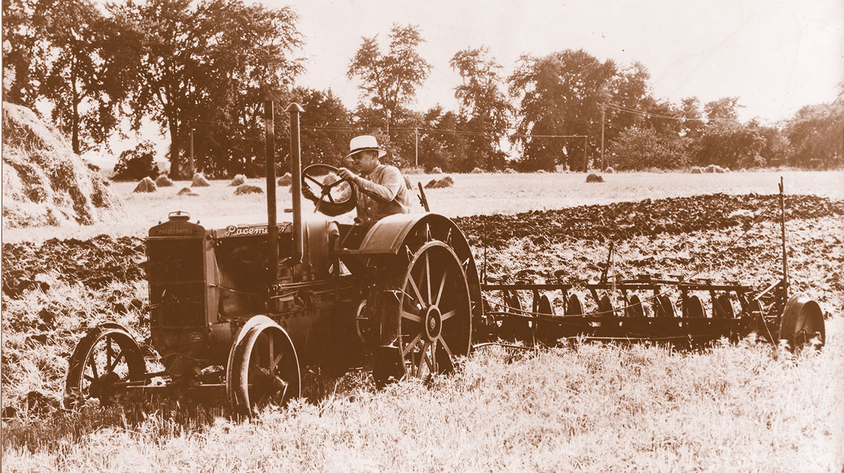 A Massey-Harris publicity picture showing an early version of the Pacemaker on a Canadian farm