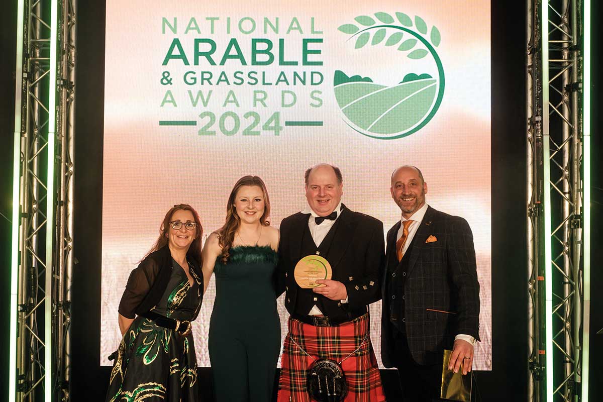 Andrew Baird (second from right) and Kirstie Morrison (second from left) receive their award