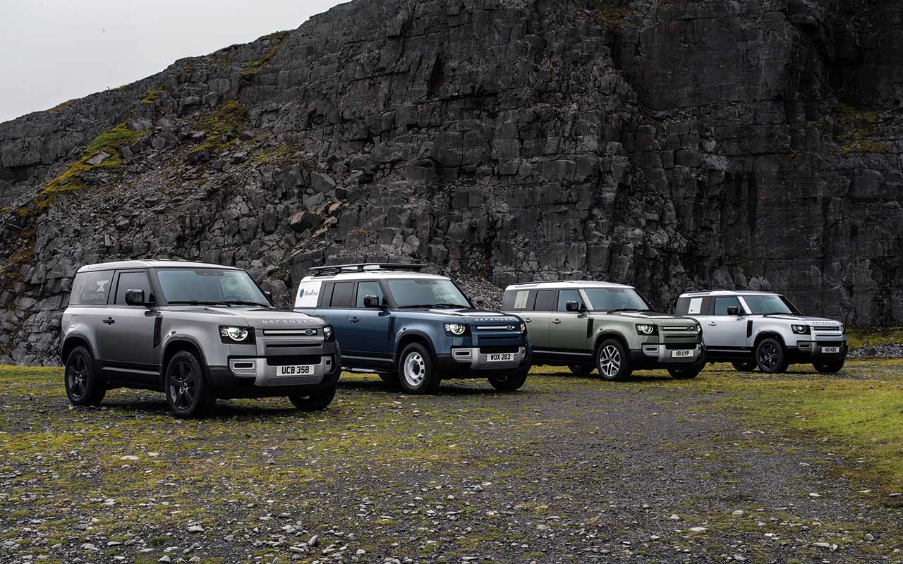 Four Land Rovers